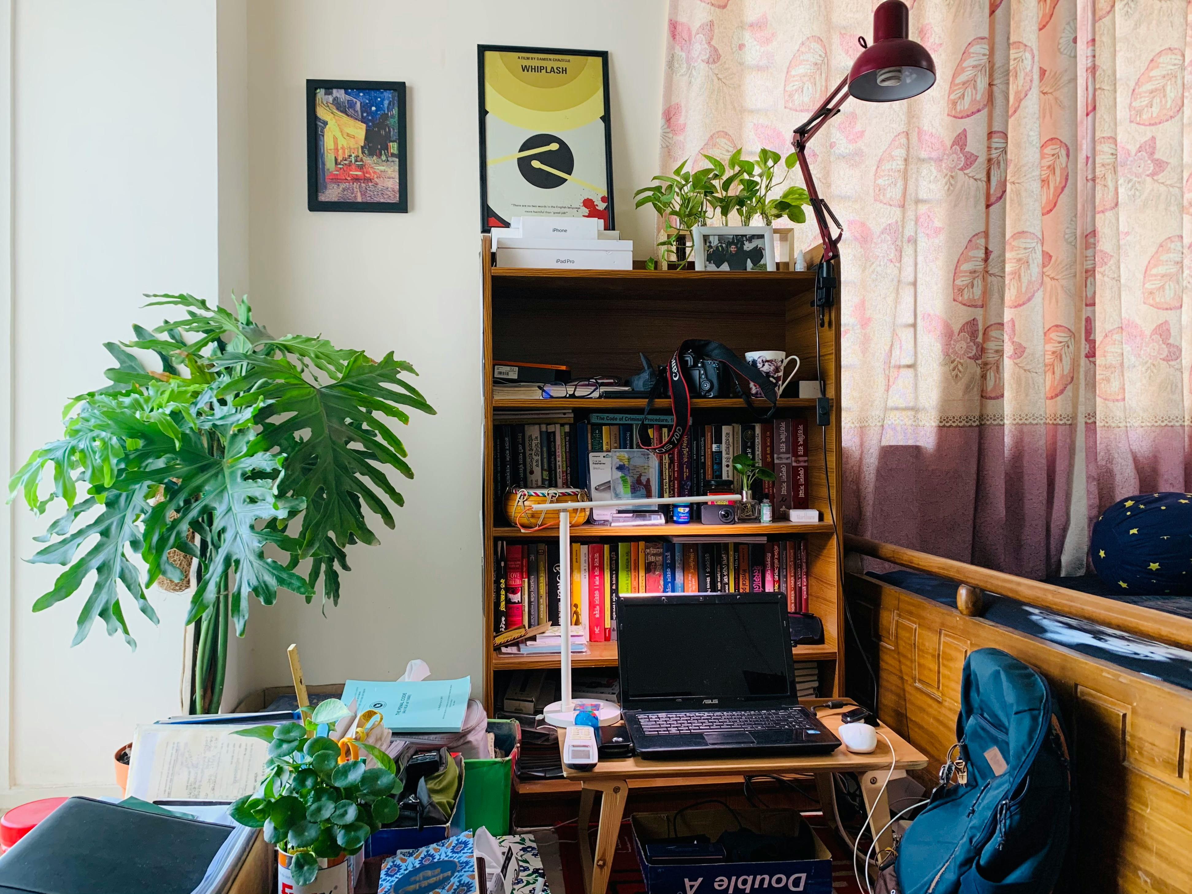 A tall bookshelf filled with books.